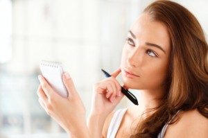 Attractive young student planning ahead